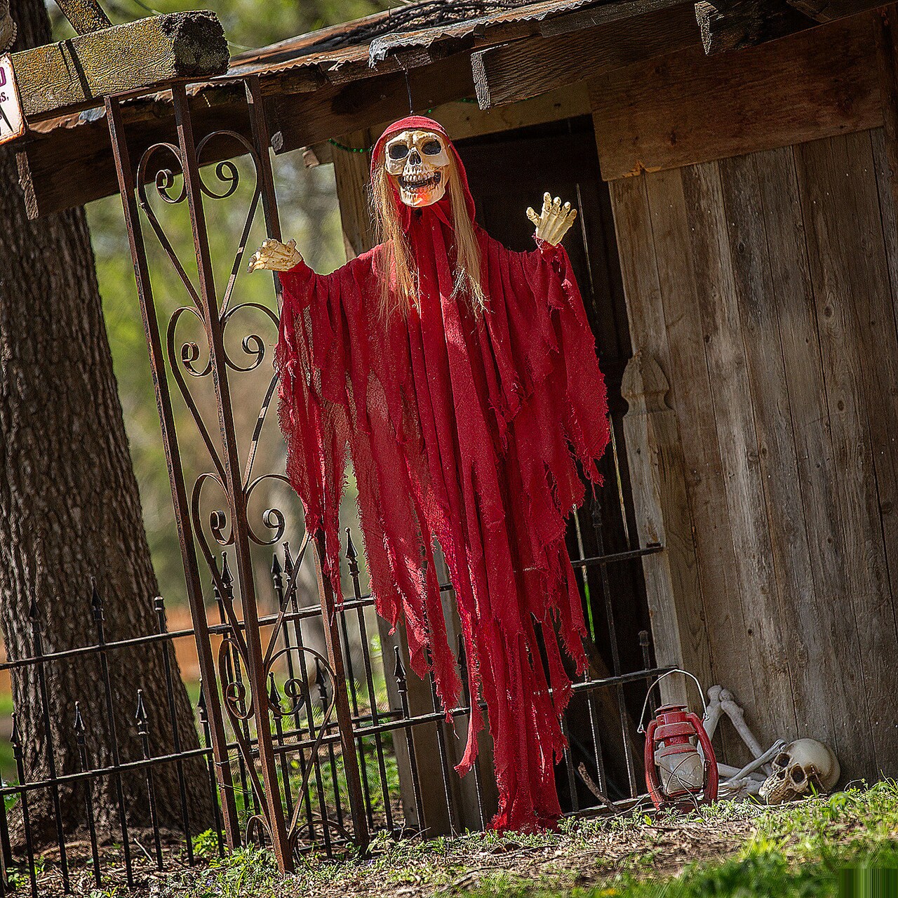Light Up Skeletal Reaper in Red Robes Halloween Hanging Decoration 66 3/4"